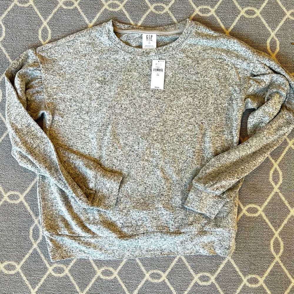 NWT. Gap girls size 10 light cozy sweater.